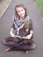 Amateur girl in black pantyhose outdoor