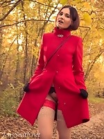 Jeny in an autumn wood takes off her coat to show her tits and legs in stockings